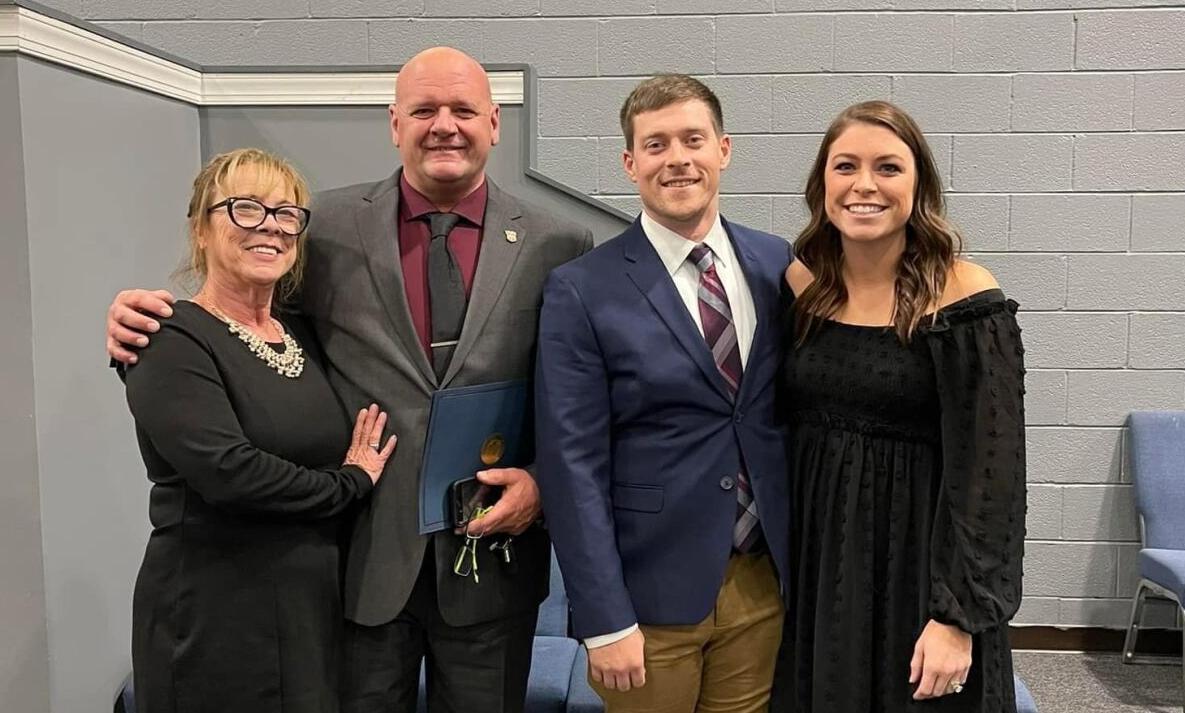 Suzi McKenna, Cpl. Steven McKenna, Sgt. JT Crowder and Colleen Crowder